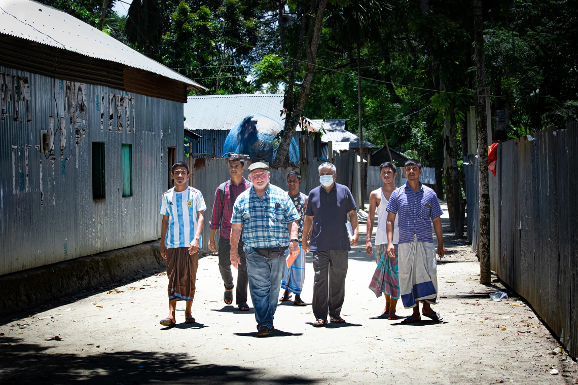 Men walking down a street in Bangladesh