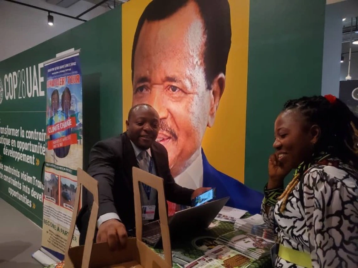 Having a discussion at the Cameroon Pavilion