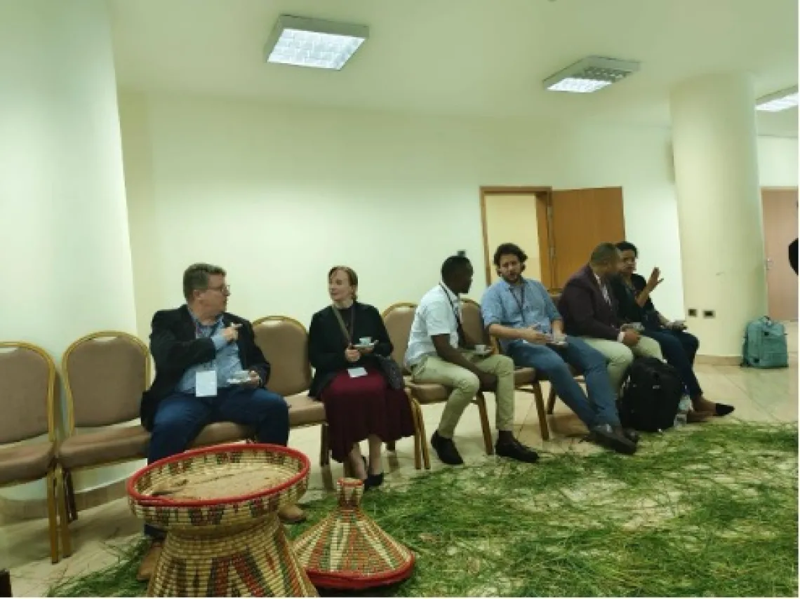 Workshop participants enjoying a surprise traditional coffee ceremony organized by InterContinental Hotel